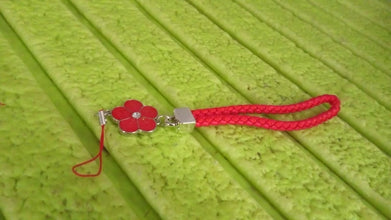 Flower Shape Metal Alloy Pendant with Braided Leather Hand Strap (1 Pc)